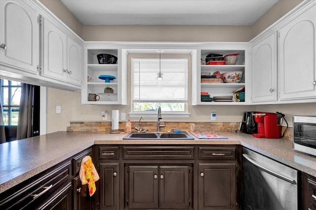 2315 Grisso Dr, Seminole, OK 74868 - kitchen with stainless steel appliances, white cabinets, a sink, and open shelves