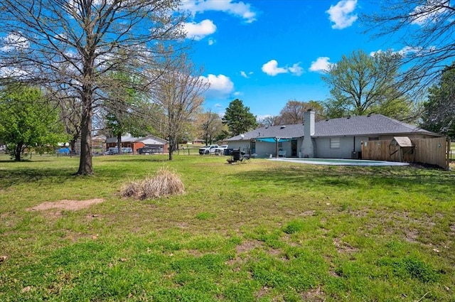 2315 Grisso Dr, Seminole, OK 74868 - view of yard with a patio and fence