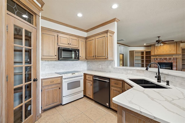 1240 Penny Ln, El Reno, OK 73036 - kitchen with dishwasher, a sink, white range with electric cooktop, crown molding, and a fireplace