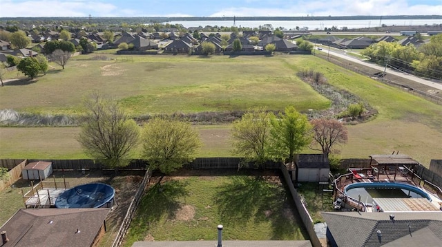 aerial view featuring a residential view and a water view