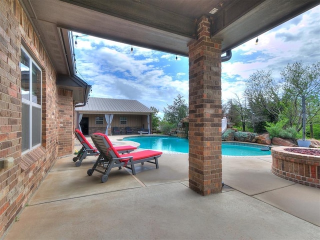 outdoor pool with a patio