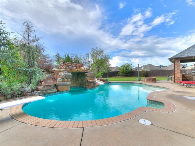 view of pool with a fenced in pool, a patio, and a fenced backyard