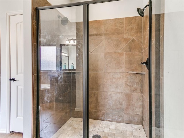 bathroom with a stall shower