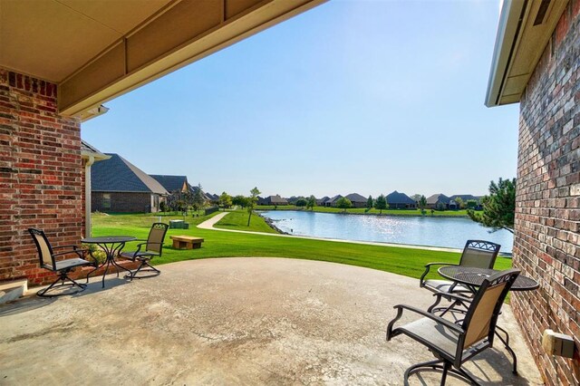 11016 Katie Beth Ln, Oklahoma City, OK 73170 - view of patio with a water view and a residential view
