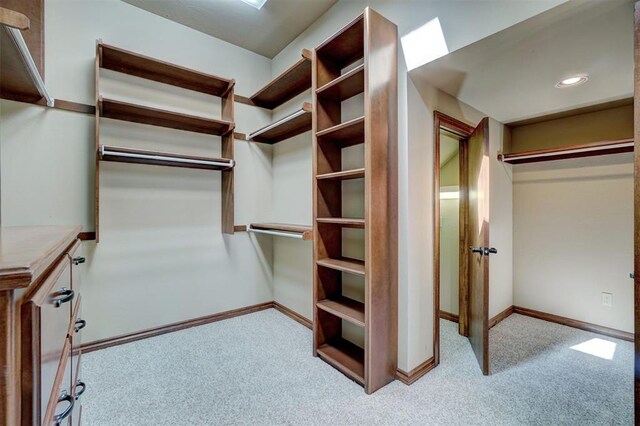 11016 Katie Beth Ln, Oklahoma City, OK 73170 - walk in closet with carpet floors
