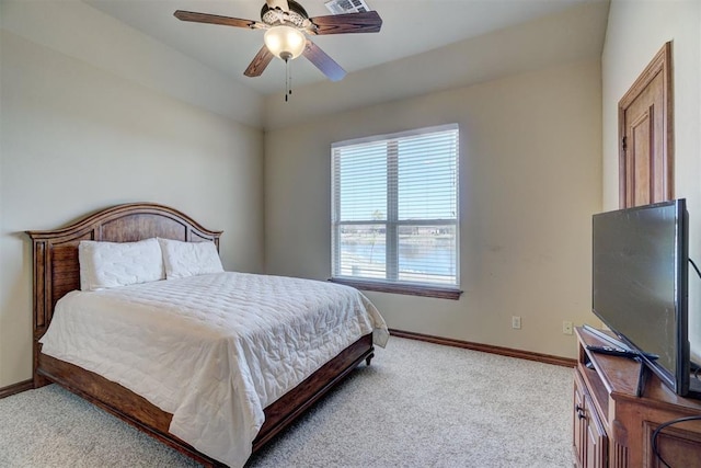 11016 Katie Beth Ln, Oklahoma City, OK 73170 - carpeted bedroom featuring baseboards and a ceiling fan