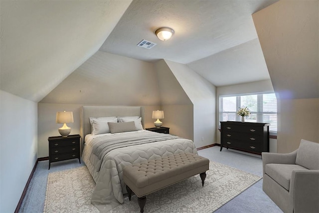 11016 Katie Beth Ln, Oklahoma City, OK 73170 - bedroom featuring light colored carpet, baseboards, and vaulted ceiling
