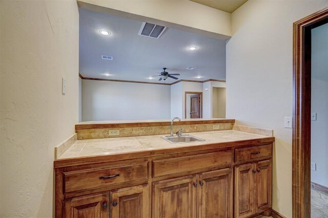 11016 Katie Beth Ln, Oklahoma City, OK 73170 - bathroom featuring a ceiling fan, vanity, recessed lighting, and crown molding