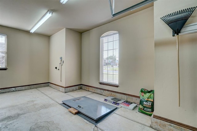 11016 Katie Beth Ln, Oklahoma City, OK 73170 - empty room featuring concrete flooring and baseboards