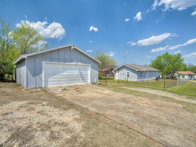 detached garage with fence
