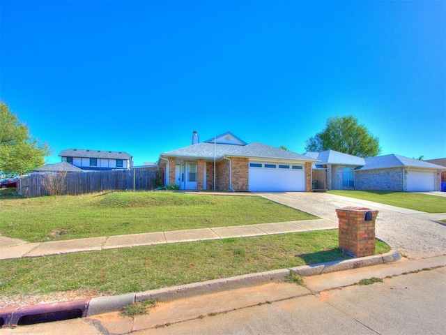 single story home with driveway, an attached garage, a front yard, brick siding, and fence