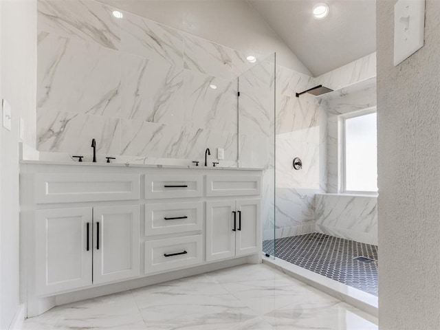bathroom with recessed lighting, a marble finish shower, lofted ceiling, marble finish floor, and a sink