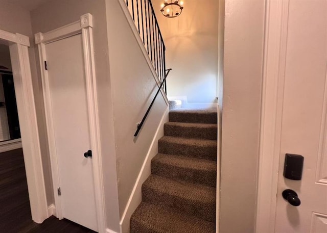 6804 Lancer Ln, Oklahoma City, OK 73132 - stairway featuring wood finished floors