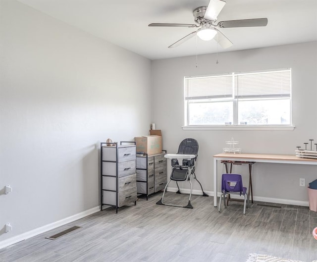 2428 SW 79th St, Oklahoma City, OK 73159 - office featuring baseboards, wood finished floors, visible vents, and a ceiling fan