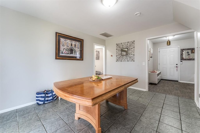 2428 SW 79th St, Oklahoma City, OK 73159 - dining room with baseboards, visible vents, and tile patterned flooring