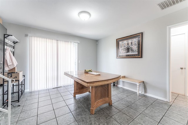 2428 SW 79th St, Oklahoma City, OK 73159 - dining area with visible vents, tile patterned floors, and baseboards