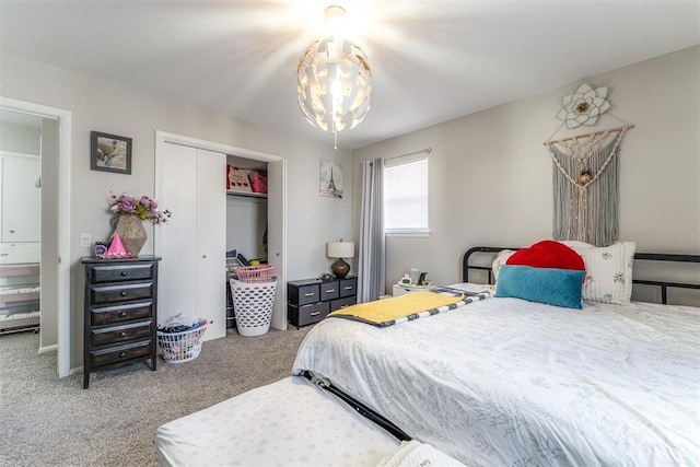 2428 SW 79th St, Oklahoma City, OK 73159 - carpeted bedroom with a notable chandelier and a closet