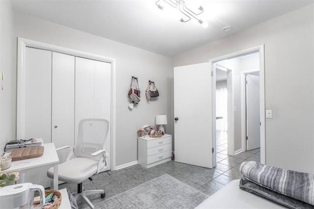 2428 SW 79th St, Oklahoma City, OK 73159 - office space with baseboards and light tile patterned floors