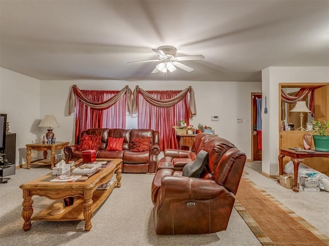 209 S 2nd Ave, Stroud, OK 74079 - living room featuring baseboards, a ceiling fan, and carpet