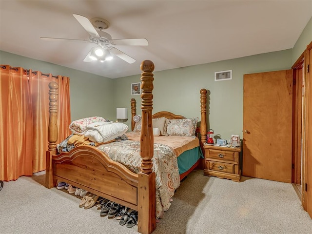 209 S 2nd Ave, Stroud, OK 74079 - carpeted bedroom featuring visible vents and ceiling fan