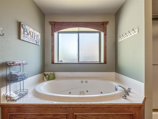 bathroom featuring a jetted tub