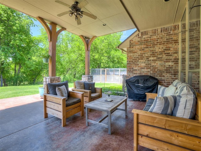 view of patio with fence, ceiling fan, outdoor lounge area, and a grill