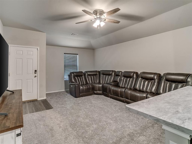 9704 Saddle Dr, Yukon, OK 73099 - living area featuring carpet flooring, visible vents, baseboards, and ceiling fan