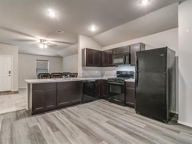 9704 Saddle Dr, Yukon, OK 73099 - kitchen with visible vents, ceiling fan, light countertops, dark brown cabinets, and black appliances