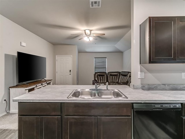 9704 Saddle Dr, Yukon, OK 73099 - kitchen featuring dark brown cabinetry, light countertops, visible vents, dishwasher, and a sink