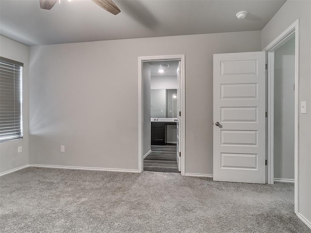 9704 Saddle Dr, Yukon, OK 73099 - unfurnished bedroom featuring carpet flooring and baseboards
