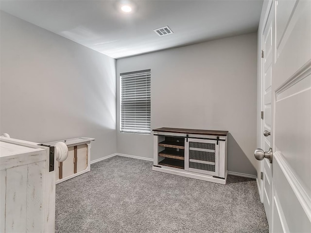 9704 Saddle Dr, Yukon, OK 73099 - spare room featuring carpet floors, baseboards, and visible vents