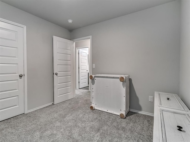 9704 Saddle Dr, Yukon, OK 73099 - unfurnished bedroom with baseboards and carpet