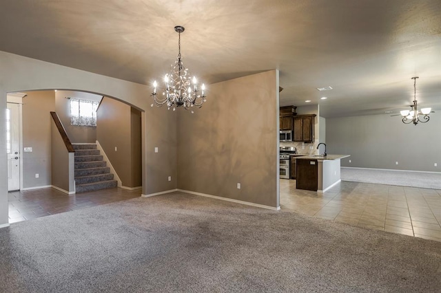 5800 SE 142nd St, Oklahoma City, OK 73165 - unfurnished living room with light carpet, light tile patterned floors, and a notable chandelier