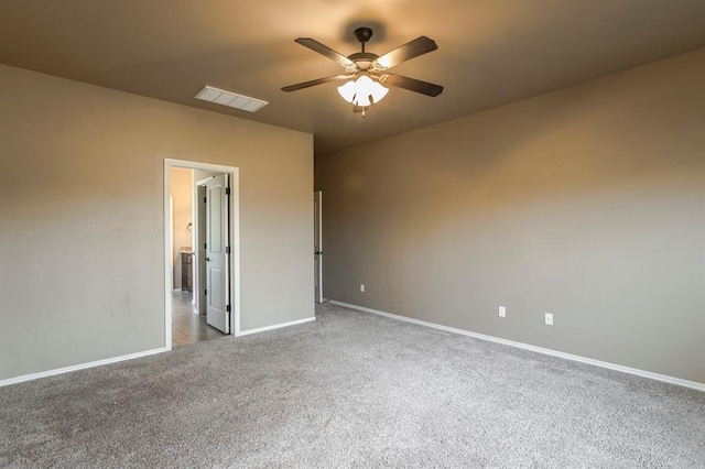 5800 SE 142nd St, Oklahoma City, OK 73165 - unfurnished bedroom with visible vents, baseboards, ceiling fan, carpet, and connected bathroom