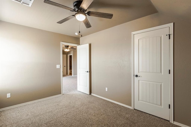 5800 SE 142nd St, Oklahoma City, OK 73165 - unfurnished bedroom featuring carpet flooring, visible vents, baseboards, and a ceiling fan