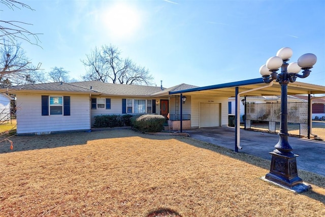 single story home with an attached garage, a carport, driveway, and a front lawn