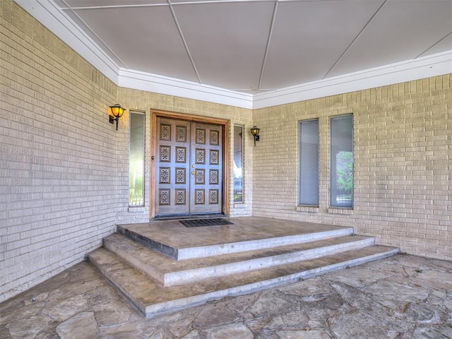 7700 S Country Club Dr, Oklahoma City, OK 73159 - entrance to property featuring brick siding and a porch
