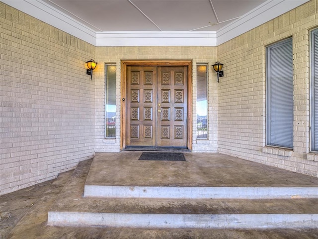 7700 S Country Club Dr, Oklahoma City, OK 73159 - entrance to property featuring brick siding and covered porch
