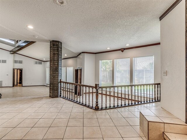 7700 S Country Club Dr, Oklahoma City, OK 73159 - empty room featuring recessed lighting, crown molding, a textured ceiling, and decorative columns