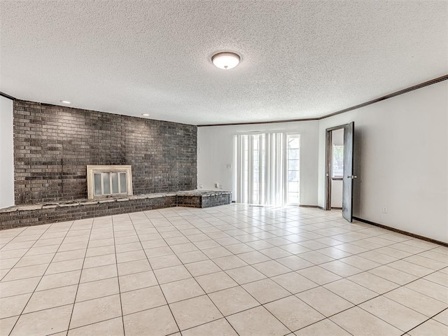 7700 S Country Club Dr, Oklahoma City, OK 73159 - unfurnished living room featuring baseboards, light tile patterned flooring, a brick fireplace, and a textured ceiling