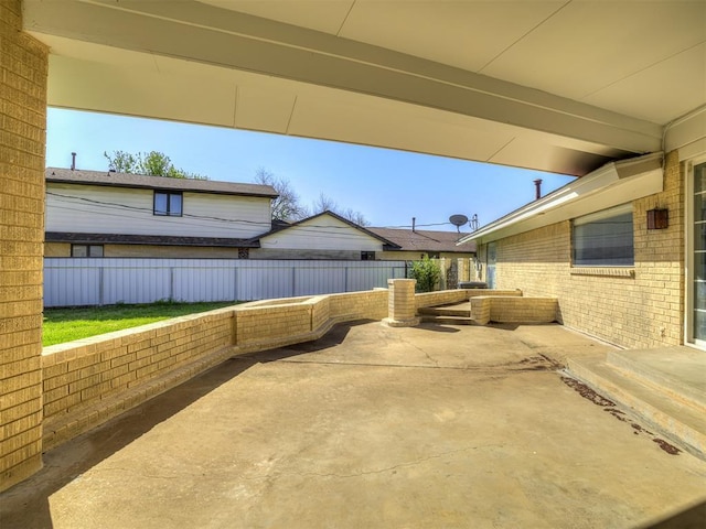 7700 S Country Club Dr, Oklahoma City, OK 73159 - view of patio with a fenced backyard