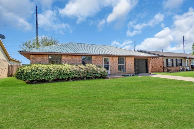 ranch-style house featuring concrete driveway, brick siding, a front lawn, and an attached garage