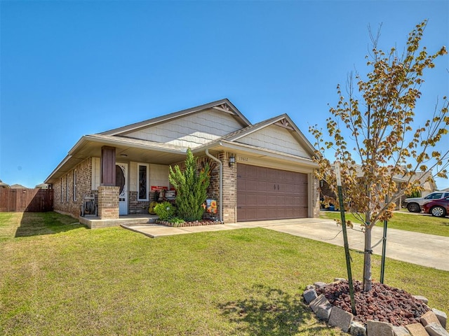 ranch-style home with a front yard, driveway, brick siding, an attached garage, and fence