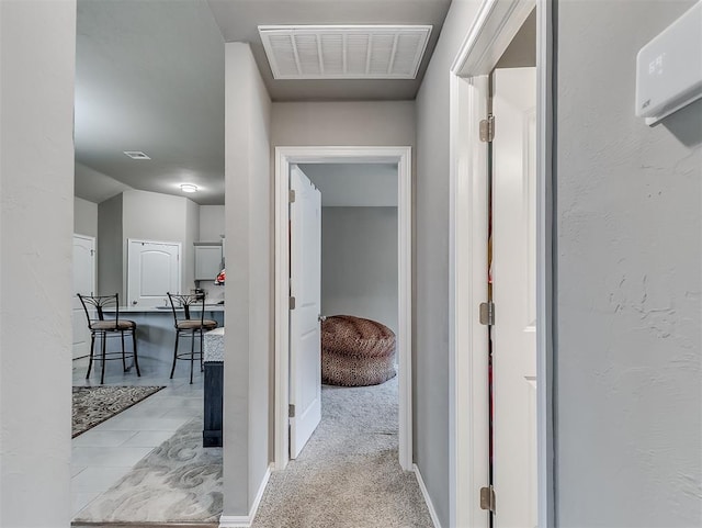 hallway with visible vents