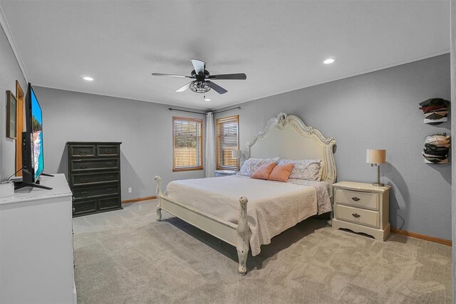 bedroom with light carpet, ceiling fan, baseboards, and recessed lighting