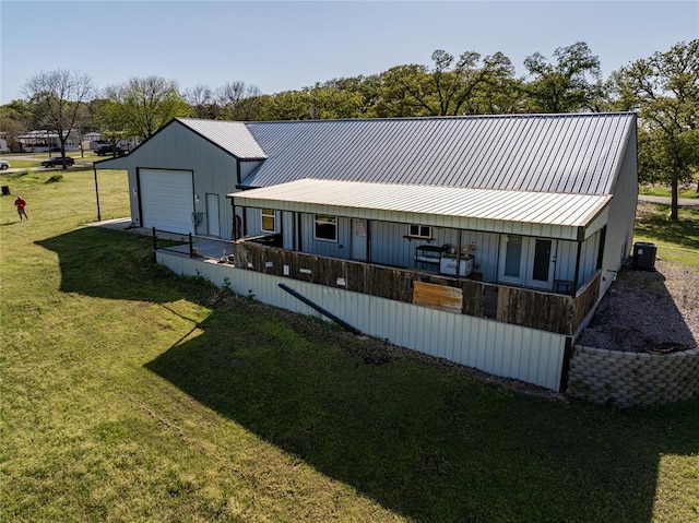 4556 Cobra Ln, Kingston, OK 73439 - back of house with metal roof and a lawn