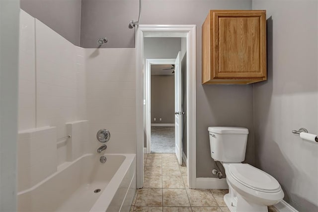 full bathroom with toilet, baseboards, tile patterned floors, shower / bath combination, and a ceiling fan