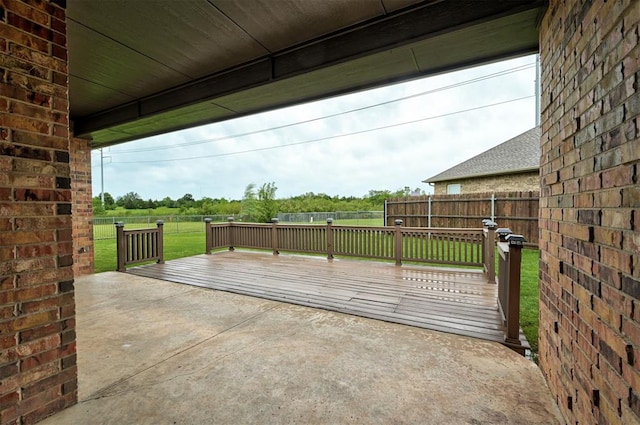 view of patio / terrace with a fenced backyard and a deck