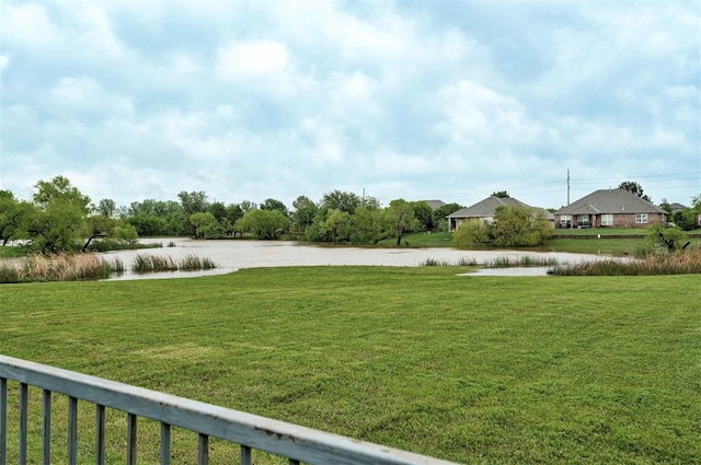 view of yard with a water view