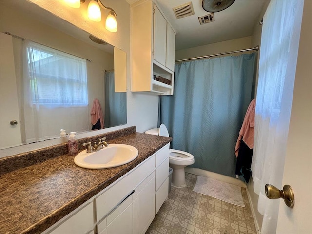 136 Skyline Dr, Chickasha, OK 73018 - full bathroom with tile patterned floors, vanity, visible vents, and toilet